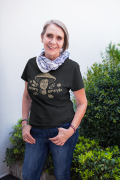 senior-woman-wearing-a-round-neck-tee-mockup-against-plants-a20667.png
