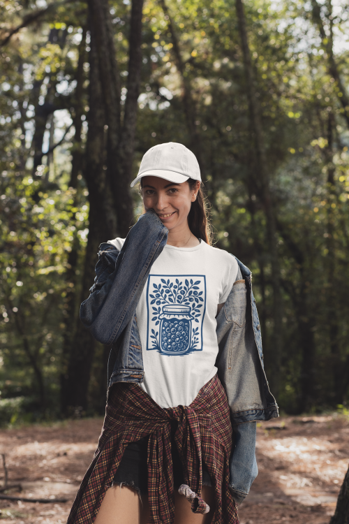 t-shirt-mockup-of-a-woman-wearing-a-dad-hat-in-the-woods-30463.png