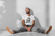 t-shirt-mockup-of-a-bearded-man-sitting-on-the-floor-45700-r-el2.png