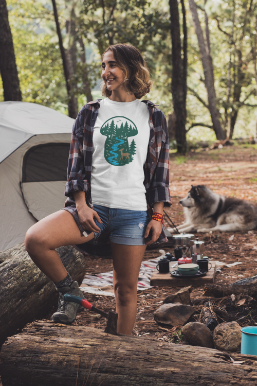 mockup-of-a-young-woman-at-a-campfire-wearing-a-customizable-t-shirt-30469.png