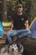 t-shirt-and-dad-hat-mockup-of-a-man-at-a-camping-site-with-his-dog-30475.jpg