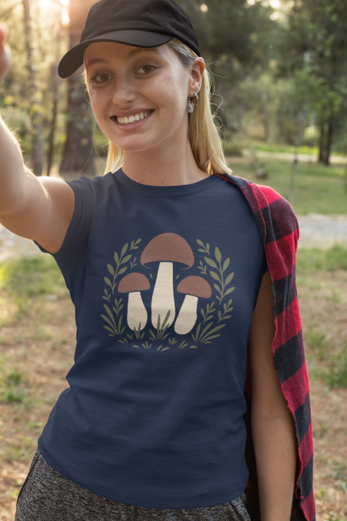 t-shirt-mockup-featuring-a-woman-taking-a-selfie-in-the-forest-32245.png